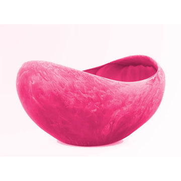 A deep pink resin bowl with a curved shape.