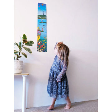 A height chart illustrated with Canberra icons including Telstra Tower, Parliament House and the loop at the Museum. There are also illustrations of birds, flowers and Australian animals.