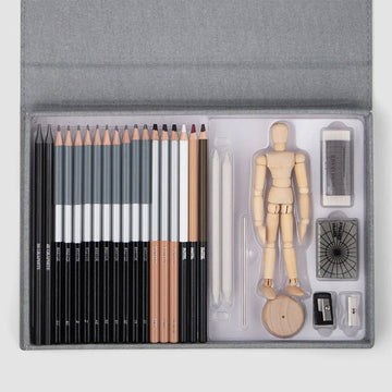 A grey textured box titled 'Emerging Artist Essentials' with a line drawing of a wood mannequin.