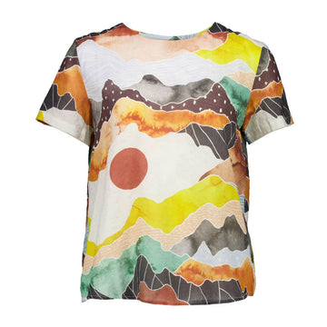 Front view of a women's top in a colourful print with tones of orange and grey.