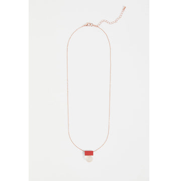 A necklace with a flame coloured rectangle and frosted clear ball pendant.
