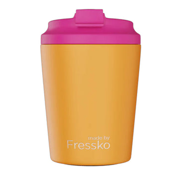 Orange tumbler with pink lid on a white background, branded 'made by Fressko'.