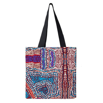Tote bag with a colorful abstract pattern on a white background.
