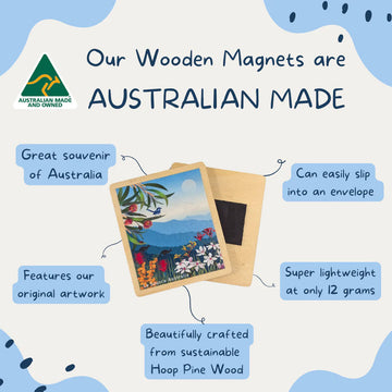 A wooden magnet illustrated with a landscape with flowers, kangaroos and a blue fairy wren.
