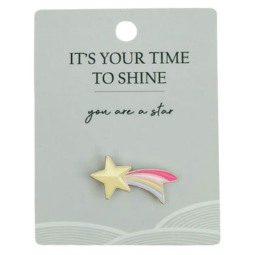 A shooting star shaped pin attached to a card with the heading 'It's Your Time to Shine'.
