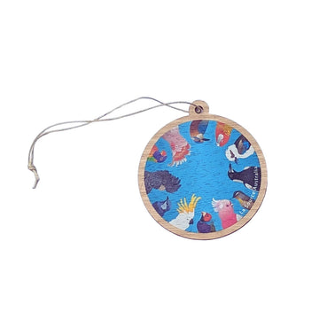 A wooden ornament illustrated with different Australian birds in a circle design.
