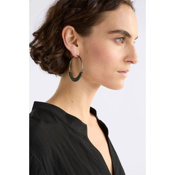 Pair of hoop earrings with green accents on a white background.