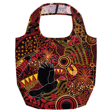 Colorful bag with abstract patterns and a central figure on a white background.