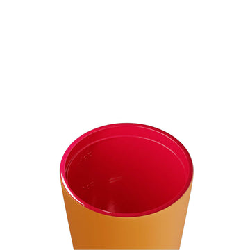 Orange tumbler with pink lid on a white background, branded 'made by Fressko'.