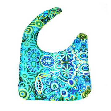 Colorful patterned bib on a white background.