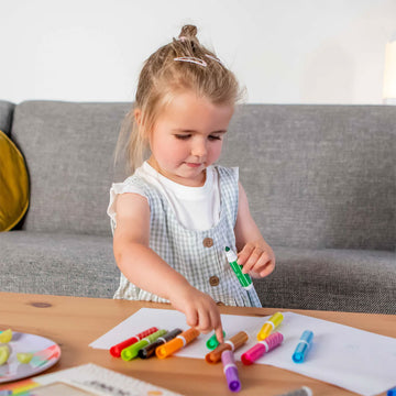 A box titled 'Junior Markers' with a cut out showing the coloured markers inside.