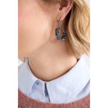 Pair of gunmetal hoop earrings on a light gray background.