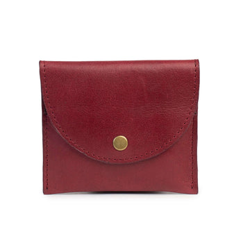 Red leather wallet with a gold button on a white background.
