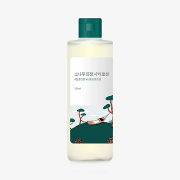 A clear bottle with a green lid and a product label with Korean text and an illustration of a person lying in a hammock. 