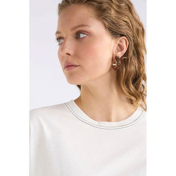 A pair of hoop earrings with brown beads.