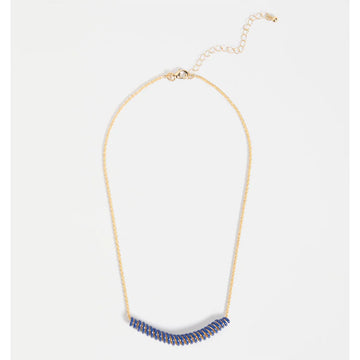 Gold necklace with blue spiral accents on a white background.
