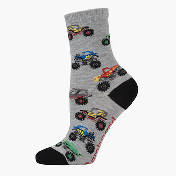 A grey sock with a black heel and toe printed with monster trucks.