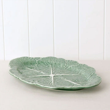 A green oval platter that looks like a platter.