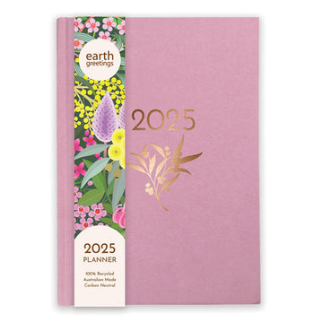 A pink planner front cover with the heading '2025' and a flower in gold with a colourful floral product label on the left side.