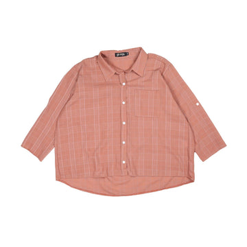 Pink checkered shirt on a white background.