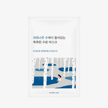 Product packaging with a design of trees and a person, featuring text in Korean.