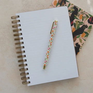 Journal with black cockatoo and banksia design on a beige background.