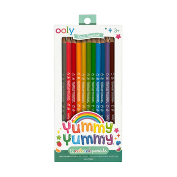 A set of twelve coloured pencils in a white box with a cut out showing the pencils inside. There is the heading 'Yummy Yummy' on the front.