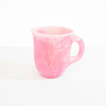 A light pink resin jug.