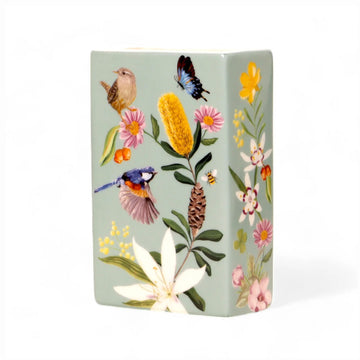 A ceramic rectangle vase illustrated with birds and flowers.