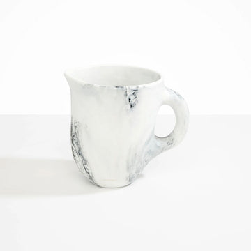 A resin jug in white marble.