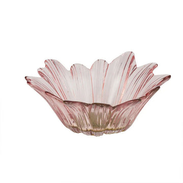 A glass pink bowl in the shape of a flower.