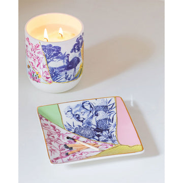 A square ceramic trinket tray with a kintsugi-style design of different colours and designs together including a koala in flowers in blue and birds and flowers in pink.
