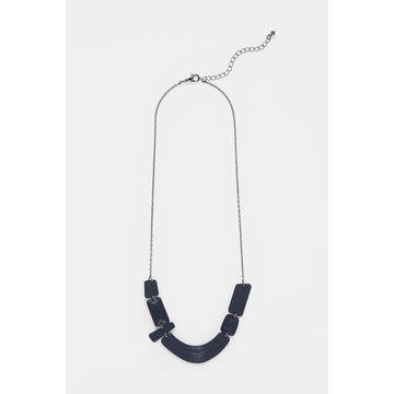 A necklace with assorted navy rectangles at the front.