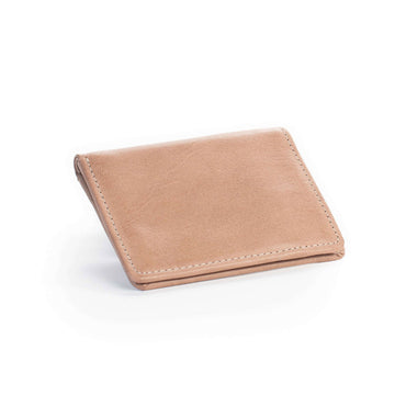 Beige leather wallet on a white background.