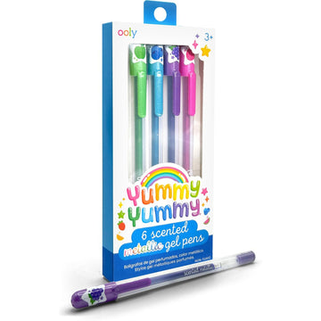 A set of gel pens in a box with a clear window. One pen is resting in front of the box. The heading 'Yummy Yummy' in rainbow colours is on the box.