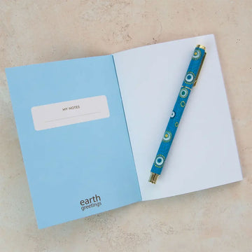 Pocket notebook with earth greetings branding on a white background.
