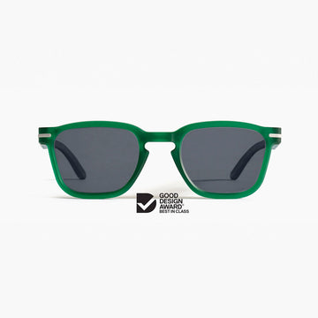 Green sunglasses with a Good Design Award logo on a white background