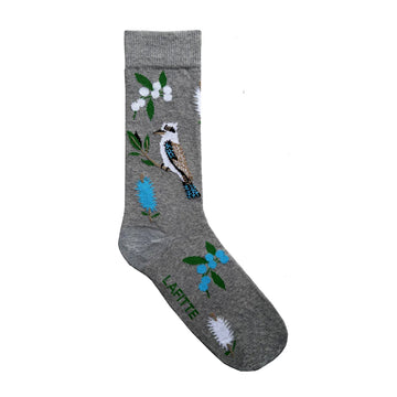 A grey sock printed with a kookaburra and blue and white flowers.