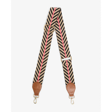 A bag strap in a black and taupe chevron stripe pattern.