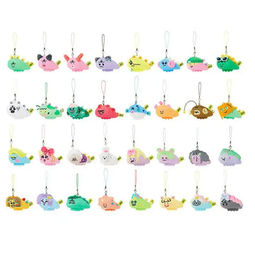 Colourful blind bag packaging shown over an assortment of plushie keyrings.