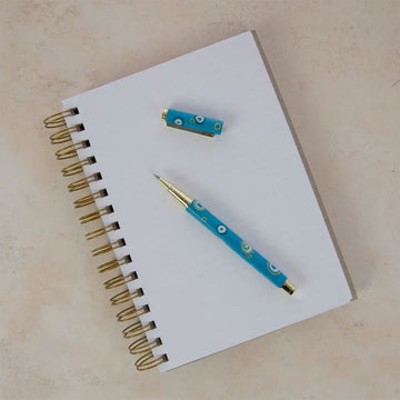 Packaging of a refillable gel pen with 'earth greetings' branding on a white background.