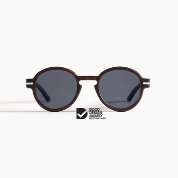 Sunglasses with a Good Design Award logo on a white background.