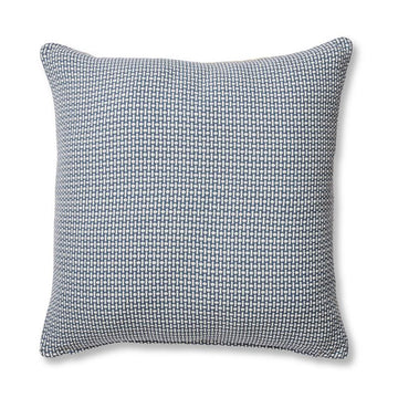 A square cushion in a blue woven design.