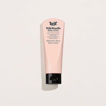 A light pink tube titled 'Leif Wild Rosella Body Lotion' with a black lid.