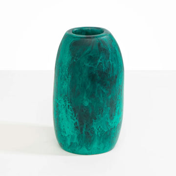 A resin vase with a slight oval shape in teal.