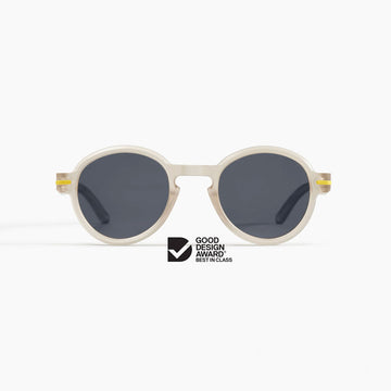 A pair of round frame sunglasses with the Good Design Award logo.