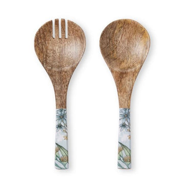 A pair of wooden salad servers printed with blue and yellow flowers on the handles.
