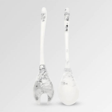 A pair of salad servers made from resin in white marble.