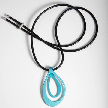A black cord necklace with an aqua blue pendant in stainless steel.