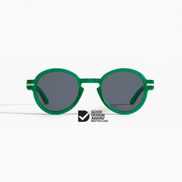 A pair of round frame green sunglasses with the Good Design Award logo.